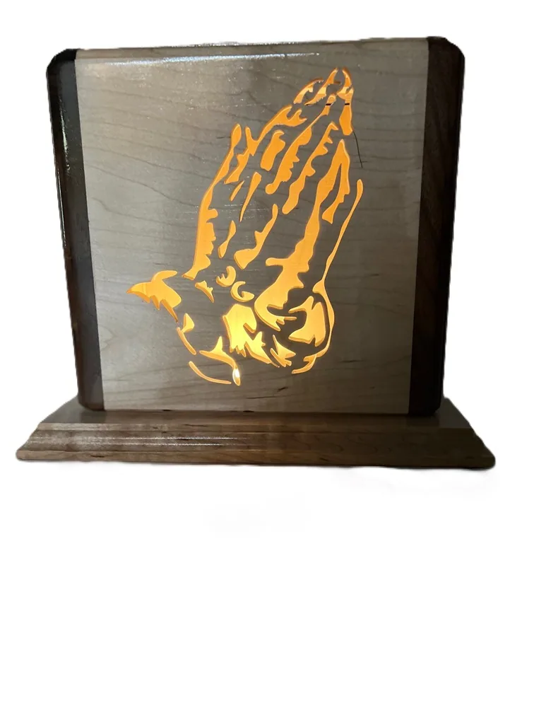 Illuminated Praying Hands